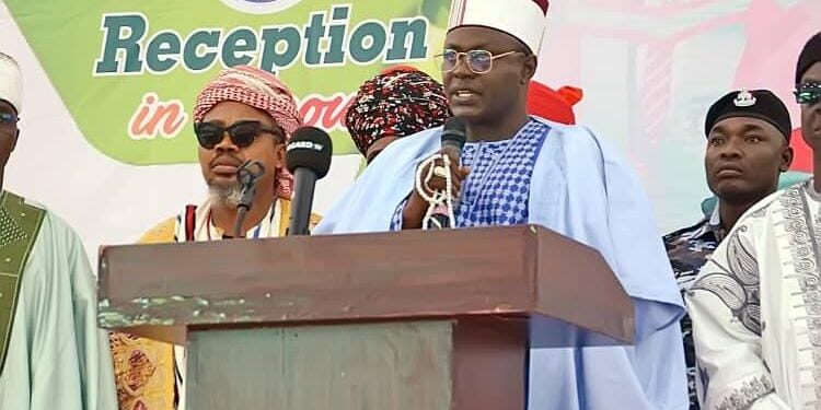 THE OHINOYI OF EBIRA, DR. AHMED TIJANI ANAJE CONGRATULATES KOGI HEAD OF SERVICE, DR. ELIJA, FOR OBTAINING THE PINNACLE OF ACADEMIC EXCELLENCE